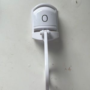 heated eyelash curler
